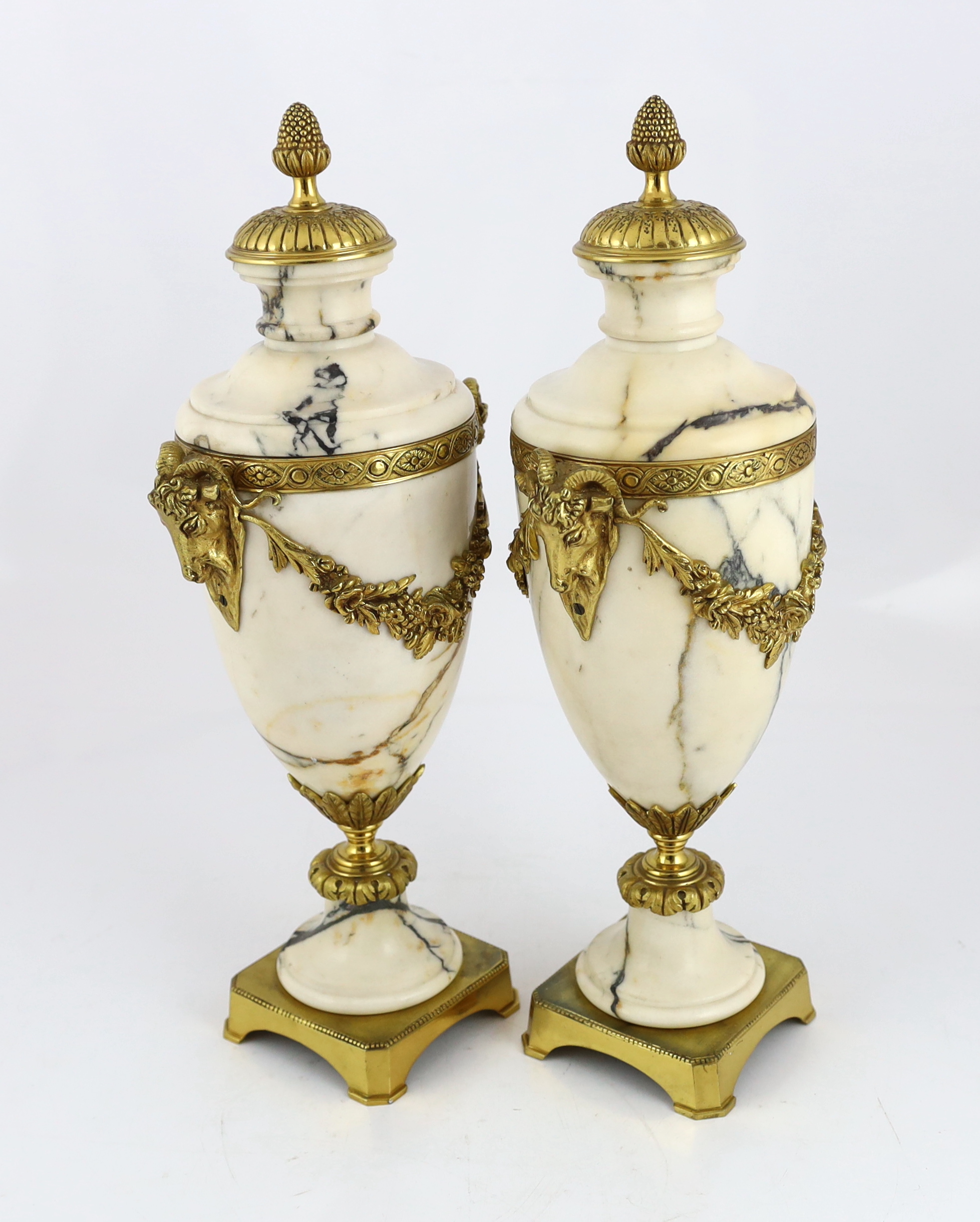 A pair of Italian ormolu mounted calacaita marble urns, 19cm wide, 44cm high